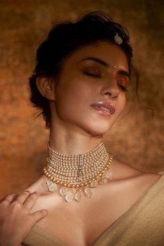 Gold toned choker with multi-layered pearl strands, stone embellished in the centre and citerine pebble drops.

Type: Pearl and Citerine Pebble
Color: Ivory
Other Details: 
Multi-layered choker
Stone drops
 - Aza Fashions Contemporary Bridal Jewellery, Choker Necklace Online, Choker Jewellery, Indian Choker Necklace, Indian Wedding Jewelry Sets, Necklaces Choker, Fancy Jewelry Necklace, Jewellery Necklaces, Pearl Necklace Designs