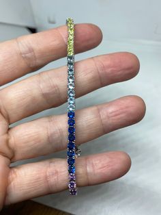 Vintage Cubic Zirconia Bracelet Clear rainbow Crystal Tennis 7.5 inches All jewelry is shipped free in the US in a nice gift box. Check out our over a THOUSAND great reviews Engraving is $4 per letter and is not always perfect depending on the piece. It can take a few days if the jeweler is busy. This is payable to Paypal Judithsltd@gmail.com Multicolor Cubic Zirconia Tennis Bracelet Gift, Multicolor Gemstone Tennis Bracelet As Gift, Multicolor Gemstone Tennis Bracelet As A Gift, Sterling Silver Tennis Bracelet With Sparkling Stones As Gift, Multicolor Multi-stone Tennis Bracelet As Gift, Elegant Multicolor Tennis Bracelet As A Gift, Luxury Multicolor Tennis Bracelet As Gift, Multi-stone Cubic Zirconia Tennis Bracelet As Gift, Rainbow Cubic Zirconia Bracelet As Gift