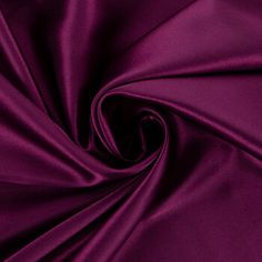 a close up image of a purple fabric