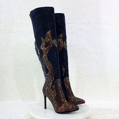 Full Body Rhinestone Boots With Flame Design 4.5" Stiletto Heels Over The Knee Height Pointed Toe Pull On With Partial Side Zipper Approx. Measurements Top Opening 18" Calf 15.5" Total Height Including Heel 24" Brand New In Original Box Authentic Brand Sourced Directly From Manufacturer Pictures Taken With And Without Flash Elegant Rhinestone Knee-high Boots For Party, Glamorous High Heel Knee-high Boots For Night Out, Rhinestone Knee-high Boots For Winter Parties, Winter Party Knee-high Boots With Rhinestones, Glamorous Thigh-high Party Boots, Glamorous Boots For Club And Party Season, Rhinestone Knee-high Boots For Party, High Heel Knee-high Boots With Rhinestones For Party, Fitted Boots With Rhinestones For Party