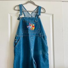 Vintage Y2k Disney Pooh Womens Denim 100% Cotton Front Pocket Embroidered Overalls Jumpsuit Size L Read: Overall It's Great Condition, But Has A Faded Stripe On One Side From Being Stored On The Sun, Although It Gives It Extra Interest ;) - Please See Photos Adjustable Straps; Runs A Bit Oversize: Waist Flat 18.5" Inseam 27.5" Rise 13" Wide Leg 14" Flat Winnie The Pooh Overalls Outfit, Retro Denim Blue Overalls With Pockets, Vintage Medium Wash Washed Overalls, Vintage Disney Overalls, Vintage Denim Blue Overalls, Denim Women, Pant Jumpsuit, Overalls, Jumpsuit Romper