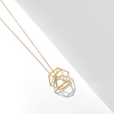 3D prism necklace Modern Geometric Gold Jewelry, Gold Necklace With Faceted Rectangular Pendant, Gold Faceted Necklace With Rectangular Pendant, Minimalist Gold Hexagon Necklace, Gold Hexagon Faceted Necklace, Minimalist Gold Hexagon Jewelry, Geometric Yellow Gold Jewelry As Gift, Modern Gold Geometric Necklace, Geometric Yellow Gold Jewelry For Gifts