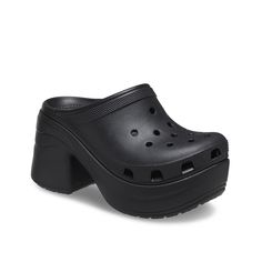 Crocs-Siren Platform Clog Elevate your casual fits with the Siren clog from Crocs. The chunky platform and heel bring a quirky touch, while the Iconic Crocs Comfort design ensures support and comfort. Casual Black Platform Slippers With Chunky Platform, Black Platform Clogs With Wedge Heel, Casual Synthetic Clogs With Lug Sole, Black Chunky Platform Clogs With Round Toe, Platform Synthetic Clogs For Streetwear, Synthetic Platform Clogs For Streetwear, Trendy Closed Toe Chunky Platform Clogs, Streetwear Synthetic Platform Clogs, Black Synthetic Clogs With Wedge Heel