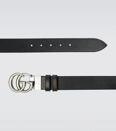 Crafted in Italy from leather, this black belt from Gucci features the label's double G buckle logo in antique silver, this style comes with punch holes for an adjustable fit. It is also reversible and comes in black and brown..Color of fastening: antique silver.Material: calf leather.Comes with dust bag.Reversible.Made in Italy.Width 3,5cm-1.5'.Buckle width 5cm-2' Modern Gucci Belts For Formal Occasions, Gucci Black Belt Buckle For Formal Occasions, Gucci Black Belt Buckle For Formal Wear, Black Gucci Belt Buckle For Formal Wear, Designer Black Belt Buckles With Belt Included, Modern Gucci Belt For Formal Wear, Classic Gucci Belt Buckles, Designer Silver Belt Buckles With Removable Belt, Classic Gucci Belt For Business