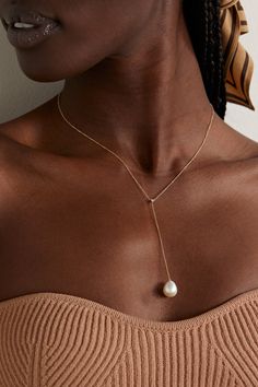 Mizuki Goltz's jewelry is influenced by her Japanese roots and background in sculpture. This necklace is strung with a single diamond above a freshwater pearl. Adjust the 14-karat gold chain to your preferred length. Luxury Drop Pearl Necklace, 14k Gold Pearl Drop Pendant Jewelry, Elegant Briolette Gemstone Drop Necklace, Fine Jewelry Necklace With Pearl Charm, Fine Jewelry Yellow Gold Pearl Chain, Fine Jewelry Yellow Gold Pearl Jewelry, Luxury Drop Pearl Necklace For Gift, Fine Jewelry Yellow Gold Pearl, Fine Jewelry In Yellow Gold With Pearl Drop