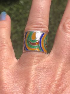 Vintage enamel rainbow thick band ring Mexico size 5.5. Beautiful vibrant colors! Multicolor Enamel Open Ring, Adjustable Multicolor Enamel Rings, Unique Handmade Multicolor Enamel Ring, Unique Multicolor Enamel Ring, Handmade Multicolor Enamel Ring, Multicolor Open Enamel Ring For Gift, Adjustable Multicolor Enamel Round Ring, Multicolor Retro Rings For Gifts, Multicolor Retro Rings For Gift