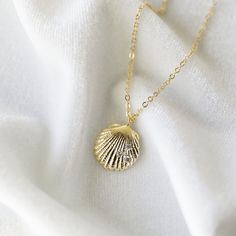 "Beautiful and lovely gold shell pendant necklace. Made of shell pendant with skinny gold plated brass chain. Soft and warm. The necklace is good for yourself or gift ! Your necklace will ship in a lovelike gift box. If you have any question please feel free to contact me. Thanks :) ♥ Chain length available 15\" - 20\" ♥ Pendant 1/2\" ♥ Gold plated over brass / Cubic Zirconia ♥ ♥ ♥ ♥ ♥ ♥ ♥ ♥ ♥ ♥ ♥ ♥ ♥ ♥ See more by lovelikestyle lovelikestyle.etsy.com ♥ ♥ ♥ ♥ ♥ ♥ ♥ ♥ ♥ ♥ ♥ ♥ ♥ ♥" Dainty Shell Necklace For Gift, Dainty Gold Shell Charm Necklace, Dainty Gold Shell-shaped Necklace, Gold Shell-shaped Charm Necklace For Gift, Gold Shell Necklace With Delicate Chain For Gifts, Dainty Shell Charm Necklace For Gift, Gold Shell Necklace With Delicate Chain As Gift, Delicate Gold Shell Necklace Gift, Delicate Gold Shell Necklace For Gift