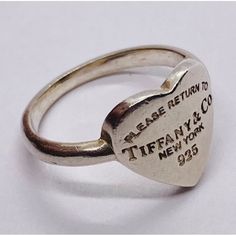 Tiffany & Co. Ring Please Return To Tiffany & Co New York 925 Silver 5.5 Please Return To Tiffany Heart Ring Size 5.5 Sterling Silver 925 Heart Measures About 12mm Top To Bottom Tiffany Heart Ring, Tiffany Co Rings, Jewelry Tiffany, Tiffany And Co Jewelry, Return To Tiffany, Tiffany Co Jewelry, Favorite Rings, Tiffany Heart, Womens Jewelry Rings