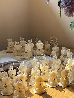 there are many small teddy bears on the table