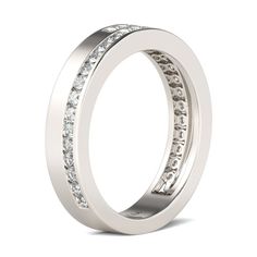 Celebrate your everlasting love story with this elegant band. Stunning as a wedding or anniversary band, it showcases a bypassing row of sparkling round stones set on a high polished shank. With grace and shimmer, this sparkling band is a classic style that complements her sophisticated taste. Carat Weight: 0.912 ctStone Size: 1.5 mmStone Type: Jeulia® StoneNumber of Stones: 32 Stone Color: Diamond WhiteStone Shape: RoundWeight: 4.57 gWidth: 3.42 mmThickness: 1.77 mmMaterial: 925 SilverPlating C Classic Half Eternity Band Promise Ring, Dazzling Half Eternity Band With Round Cut, Classic Eternity Band With Channel Setting For Formal Occasions, White Half Eternity Band For Formal Occasions, Classic Channel Set Eternity Band For Formal Occasions, Formal White Half Eternity Band, Elegant Promise Ring With Channel Set Bands, Elegant Channel Set Promise Ring Bands, Classic Diamond White Eternity Band For Promise