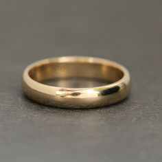 This 14k yellow gold heavy ring is a classic piece perfect for any jewelry collector! Worn with multiple bands it gives some great depth and also makes for a perfect wedding ring! ⊹ Vintage 14K Yellow gold⊹ Stamp reads 14K⊹ Excellent vintage pre-owned condition⊹ Ring Size: 7.5⊹ Width: 3.9mm Yellow Gold Wide Band Ring Stamped 14k, Heirloom Wide Band Yellow Gold Ring, Classic Jewelry With Diamond Cut And Thick Band, Heirloom 14k Gold Wedding Band Thick Shape, Heirloom Yellow Gold Thick Band, Heirloom Thick Band In Yellow Gold, Timeless Thick Band Ring For Anniversary, Classic Formal Couple Rings Stamped 14k, Heirloom 14k Gold Wide Band Wedding Ring