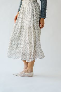 Get ready to twirl in style with the Antosh Tiered Patterned Midi Skirt! This cream-colored skirt features playful tiers and a unique pattern for a fun and quirky look. Perfect for adding personality to any outfit, this skirt will have you feeling confident and stylish. Details self/lining: 100% polyester Fabric Care Guide Here Sizing & Fit Measurements are approximate and taken while laying flat across the front. Not doubled. small: waist = 14"; length = 33" medium: waist = 15"; length = 33" la Patterned Midi Skirt, Midi Skirt Pattern, Feeling Confident, Ribbed Cardigan, Small Waist, Feel Confident, Try On, Unique Patterns, Fabric Care