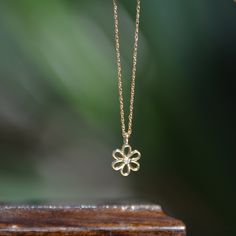 "Tiny Flower Diamond Necklace, Floral Dainty Necklace Gold 14K Solid , Nature Jewelry, Minimalist Solid Gold Charm Necklace, Gift for Her Diamond Flower Necklace with 14k solid gold chain. Tiny pendant is set with genuine natural round brilliant diamonds. Both the pendant and chain weigh a total of 1.00 gr.  ▶ Product Details ○ Diamond: 100% Natural Diamond ○ Diamond Weight: 0.01 CTW  ○ Pendant Size: 5 x 5 mm ○ Color: G Color  ○ Clarity: VS-SI ○ Cut: Brilliant Cut ○ Metal: 14K Solid Yellow Gold  ○ Gold Color Options: Yellow Gold , White Gold  ○ Adjustable Chain Length: 16\" - 18\" - 20\"  ♦ Handmade 🚚 SHIPPING All items are handmade to order. Therefore, the whole process of crafting and shipping generally takes 2-4 business days. If you need your order by a certain date, please send us a Everyday Yellow Gold Flower-shaped Jewelry, Yellow Gold Flower Jewelry For Everyday, Everyday Yellow Gold Flower Jewelry, 14k Gold Flower Pendant Charm Necklace, 14k Gold Flower Charm Necklace, Dainty Yellow Gold Flower Pendant Charm Necklace, Dainty Yellow Gold Charm Necklace With Flower Shape, Minimalist Yellow Gold Necklace With Flower Charm, Gold Flower Shaped Necklace For Everyday