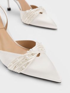 Charles And Keith Wedding Shoes, Wedding Shoes Satin, Wedding Shoes Slingback, Modern Bridal Shoes, Wedding Shoes Chanel, White Heels Elegant, Satin Bridal Shoes, Elegant Pearl Embellished Ankle Strap Heels, Elegant Satin Slingback Pumps With Pointed Toe