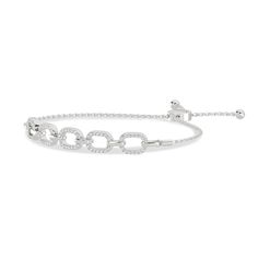 The bracelet is made up of 5 pave diamond links united by gold connectors. With a timeless design and adjustable slider clasp, this bracelet is imbued with style and comfort. Bolo Bracelet, Together Forever, Tennis Bracelet, Diamond Cut, Pave Diamonds, You Bag, Timeless Design, Diamond Cuts, White Gold