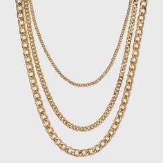 Get a layered jewelry look with ease with this 16-Inch Layered Curb Chain Necklace from A New Day™. Featuring three different thicknesses of chain in a shiny gold finish, this three-layer gold chain necklace makes it easy to create a coordinated look that instantly elevates a plain tee or a variety of other outfits. A lobster claw clasp closure makes for easy fastening at the back, and the shiny gold finish pairs perfectly with casual and dressy looks alike. A New Day™: Style that goes wherever Gold Layered Necklace With Chunky Chain Links, Double Layer Necklace, Layered Chain Necklace, Layered Chains, Plain Tees, Gold Choker, Layered Jewelry, Gold Chain Necklace, A New Day