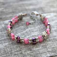 The bracelet is handmade using fresh water pearl and cateye. The fuchsia is a lively and feminine color, a nice blend of passion and tenderness The length of the earrings is 7-8 ¼ inches, 18-21. (excluding the length of hook) For matching earrings, please go to1: https://www.etsy.com/listing/95985512/earrings- For matching earrings, please go to2: https://www.etsy.com/listing/151339368/earrings?ref=shop_home_active For matching necklace, please go to: https://www.etsy.com/listing/118410657/neckl Elegant Pink Hypoallergenic Beaded Bracelets, Elegant Pink Hypoallergenic Bracelet, Delicate Pink Pearl Bracelet For Gift, Delicate Pink Pearl Bracelet As A Gift, Delicate Pink Pearl Bracelet As Gift, Delicate Pink Pearl Bracelet Gift, Adjustable Pink Pearl Bracelet Gift, Delicate Pink Pearl Bracelet With Round Beads, Handmade Dainty Pink Pearl Bracelet