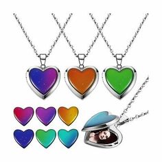 four heart shaped lockes are shown with different colors and shapes on the front, one is