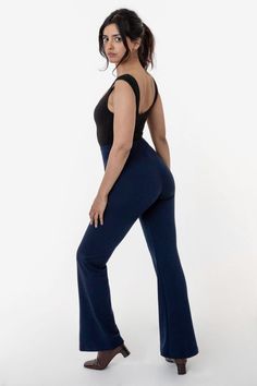 The Ponte Flared Legging is our updated take on the classic jazz pant. These pants are made of a smooth, heavyweight Ponte fabric that stretches and flatters your curves. These leggings are high waisted, fitted through the thigh and flare slightly towards the ankles. We've given this style a half inch elastic waistband for a seamless look without any extra bulk. This versatile legging can be styled like a trouser with your favorite mid-length blouses and cropped sweaters and finished with a stra Basic Crop Tops, Jazz Pants, Cropped Sweaters, Classic Jazz, Flare Legging, Nyc Design, Dance Pants, Navy And Brown, Flare Leggings