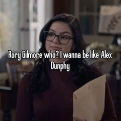 a woman with glasses holding a paper bag in her hand and the words roxy ghirmore