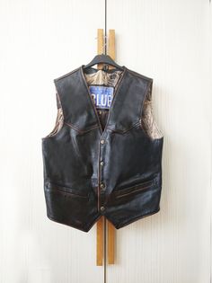 Vintage Rock N Blue leather vest. 100% real leather. Lining is covered in photos of famous blues artists. In very good condition. Good quality and durable construction combine for an expensive looking vest. Color: Antique Brown Surface material: 100% Leather Lining: 100% Cotton Size: S MEASUREMENTS * Chest :49 cm/19.29'' Shoulders:40 cm/15.74'' Total length : 60 cm /23.62''on the front *Please check the measurements below to make sure they fit correctly! Because international shipping takes long Patch Vest, Rock Vintage, Motorcycle Vest, Blues Artists, Vintage Rock, Rock Design, Leather Gifts, Vest Outfits, Leather Vest