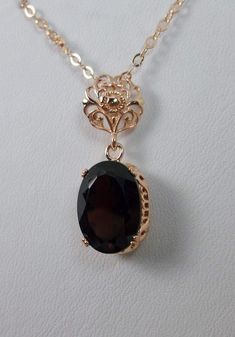 red garnet pendant, with a natural red garnet oval stone set in floral rose gold filigree, 4 prongs hold the gem in place Edwardian Necklace, Antique Filigree, Filigree Necklaces, Filigree Jewelry, Ornament Ideas, Jewelry Accessories Ideas, Garnet Pendant, Aesthetic Things, Pretty Necklaces