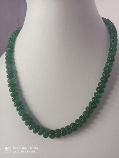 18''Natural Green Strawberry Quartz AAA 315 Carat Fine Quality Smooth Pumpkin Beads Gemstone adjustable cord Necklace Stone :Natural Green Strawberry Quartz Shape :- fancy Pumpkin Necklace - 18 inch 1 line string Size :- 7-10 MM Weight :- 315 carat Polish :- Handmade Quality - AAA Purity :- 100% Natural Gemstone color - green makes a great gift for your loved ones. It is known as the 'love stone' as the message it emits is the strong vibration of unconditional love, joy, warmth and healing. As q Rondelle Crystal Necklace With Gemstone Beads, Adjustable Rondelle Gemstone Bead Necklaces, Handmade Adjustable Emerald Necklace, Handmade Adjustable Emerald Necklace With Round Beads, Handmade Adjustable Beaded Emerald Necklace, Adjustable Rondelle Crystal Necklace For Healing, Adjustable Spiritual Rondelle Necklaces, Adjustable Single Strand Rondelle Beaded Necklace, Adjustable Single Strand Rondelle Beads