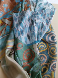 "Women Silk Scarf Wedding accessory in pastel blue, Luxury handpainted shawl, Unique gift mum | Evening scarf | Blue gray shawl in Art deco style, Luxury gift for teacher, Gift for art lover woman Birthday gift for mom, for sister, Mother in low gift ♥ size is 35 by 70 inches This beautiful Rusty blue scarf is painted on pure silk pongee 5 I therefore recommend hand-washing only, in lukewarm water with a gentle cleanser. The hand painted scarf will be a unique gift for Christmas. Ready to ship S Blue Bohemian Hand Painted Silk Scarf, Blue Hand Painted Bohemian Silk Scarf, Bohemian Blue Hand Painted Silk Scarf, Artsy Blue Silk Scarf Gift, Evening Scarf, Woman Birthday, Blue Luxury, Hand Painted Scarves, Painted Scarf