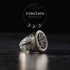 Crafted with an artful touch, the "Timeless Wisdom Oval Signet Ring" is a sophisticated piece that encapsulates the essence of resilience and the enduring human spirit. Embracing the intricate art of engraving, this ring boasts a central motif adorned with the uplifting inscription 'buda geçer yahu', a Turkish adage meaning 'this too shall pass' - a timeless reminder that all experiences, good and bad, are fleeting. The sides of the ring are embellished with fine micro gemstones, adding a touch Traditional Oval Engraved Ring With Intricate Design, Traditional Oval Engraved Anniversary Ring, Luxury Oval Signet Ring With Intricate Design, Oval Spiritual Rings With Polished Finish, Oval Spiritual Ring With Polished Finish, Oval Silver Signet Ring For Promise, Luxury Silver Rings With Etched Details, Engraved Oval Signet Ring For Promise, Artisan Engraved Hallmarked Ring As Gift