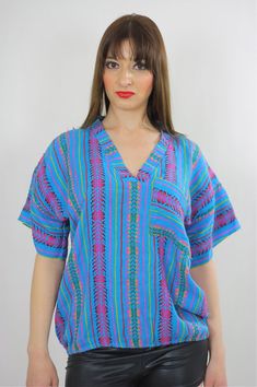 Tribal shirt Ethnic woven tunic Vintage 70s Hippie Boho abstract Gypsy kimono short sleeve striped D Vintage V-neck Top For Vacation, Bohemian Blue V-neck Tops, Vintage V-neck Top With Boho Print, Bohemian Short Sleeve Tops For Spring, Retro Short Sleeve Blouse For Beach, Blue Hippie V-neck Top, Bohemian Patterned Short Sleeve Tops, Bohemian Multicolor Short Sleeve Top, Bohemian Short Sleeve Patterned Tops