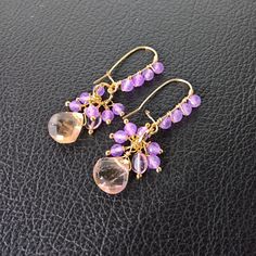 "Introducing our exquisite Natural Teardrop Ametrine and Amethyst Cluster Earrings - a luxurious gift for the special woman in your life. These handcrafted earrings boast the timeless elegance of genuine, real gemstones in a stunning bicolor combination of yellow and violet hues. 🌟  Material: Faceted ametrine teardrop gemstone 12mm Micro faceted amethyst gemstone beads 4mm Micro faceted lilac zircon gemstone beads 4mm 18K gold plated earrings hooks and earrings finding 🌟 Each earring features Raw Stone Earring, Zircon Gemstone, Gem Earrings, Goth Jewelry, Earrings Purple, Silver Earrings Handmade, Rainbow Earrings, Amethyst Cluster, Amethyst Jewelry