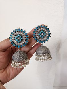 Around 3.5 inches long Light weight Brass made Traditional Handmade Blue Danglers, Blue Handmade Danglers For Festive Occasions, Blue Bohemian Jhumkas For Festive Occasions, Bohemian Blue Danglers For Wedding, Blue Bohemian Danglers For Wedding, Blue Metal Earrings With Latkans, Blue Festival Earrings With Latkans, Blue Dangle Chandelier Earrings With Latkans, Handmade Blue Drop Earrings