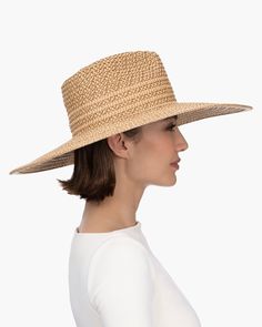 A maritime-inspired fedora made of Squishee® is perfect to use for sun protection in a resort setting where having style matters.This designer Women’s hat for sale online, with its large, contrast striped dip brim and tall elegant fedora crown, has flare to spare! Independent Testing in accordance with AATCC( American Association of Textiles and Chemists and Colorists) awarded Sea La Vie the UPF 50+ rating for ultraviolet protection. Because of slight pin hole perforations in the weave, however Spring Coastal Boater Hat Made Of Toquilla Straw, Elegant Straw Boater Hat With Upf 50+, Elegant Boater Hat With Visor For Spring, Elegant Spring Boater Hat With Visor, Elegant Wide Brim Boater Hat For Travel, Elegant Upf 50+ Straw Hat For Kentucky Derby, Elegant Boater Hat With Visor For Vacation, Elegant Fedora With Curved Brim For Vacation, Elegant Boater Hat With Upf 50+ And Short Brim