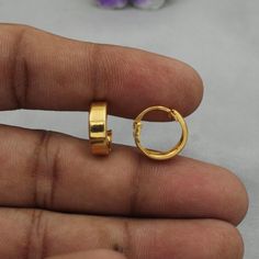 Pure Handmade Beautiful yellow gold Hoop Bali earrings Gold Purity- 22k yellow Gold Full Length - 1.3 cm Full Width - 1.3 cm Weight: 1.83 grams approx click to see similar https://www.etsy.com/in-en/shop/morvijewels?ref=seller-platform-mcnav Simple Design Drop Earrings As A Gift, Simple Design Drop Earrings Jewelry For Gifts, Simple Drop Earrings Jewelry As A Gift, Gold Tarnish Resistant Huggie Earrings As Gift, Gold Tarnish Resistant Huggie Earrings For Gift, Simple Drop Earrings As A Gift, Gold Minimalist Earrings For Gift, Gold Tarnish-resistant Huggie Earrings As A Gift, Gold Hoop Earrings With Ear Wire For Wedding