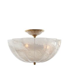 a semi flusher light fixture with frosted glass shades