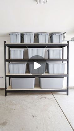 a shelf filled with lots of buckets and bins