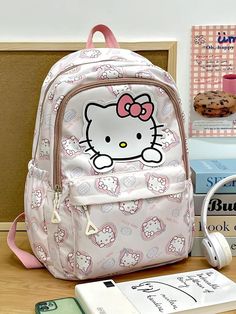 Carry your essentials in this adorable backpack that showcases a playful Hello Kitty design. The spacious compartments and durable construction make it both cute and practical for daily use, adding a touch of fun to your outfit. Kawaii aesthetic Sanrio characters: hello kitty, kuromi, cinnamoroll, pochacco, my melody, pompompurin Zip closure Side water pocket Laptop, tablet pocket inside Size: length 30cm (11.81inch), height 43cm (16.92inch) Sanrio Backpack, Fall Sweaters For Women, Bags Pattern, Kitty Items, Hello Kitty Kuromi, Crop Pullover, Couture Style, Denim Hoodie, Jogger Pants Casual