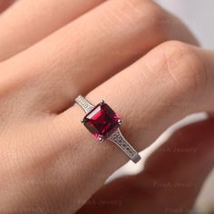 ◆ Hand-finished in Sterling sliver, this piece features a Asscher shaped ruby. Clear zirconia stones decorate half of the ring shank. A piece of classic, it is suitable for engagement, party, daily occasion. ◆ Production Description: Main stone Type: Lab Ruby Main Stone Shape: Asscher Main Stone Size: 7*7mm Side stone: CZ Metal: 925 Sterling silver - Other options available in the drop down menu ◆ Customization: √Free for Add Engraving √Other Metal Type Available √Other Gemstones & Shapes Av Rubin Ring, Black Spinel Ring, July Birthstone Ring, Green Sapphire Ring, Minimalist Engagement Ring, Spinel Ring, Ring Shank, London Blue Topaz Ring, Half Eternity Band