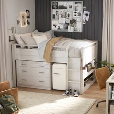 a bedroom with a bed, desk and chair