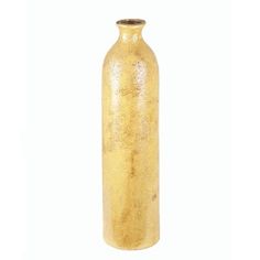 a gold colored vase is shown against a white background