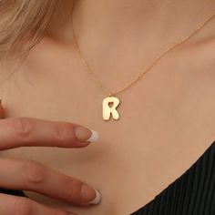 Unveil the poetry in every moment with our exquisite Custom Love Letter Necklace. Imbued with the timeless allure of 14K gold plating on 925 sterling silver, each piece is more than jewelry; it's a reflection of the sentiments that echo within the chambers of the heart 💖 Crafted for Meaning: Personalize this piece with a chosen initial, turning a simple accessory into a treasure trove of emotions. The 14K Gold Heart Initial Pendant is not just a symbol; it's a testament to the unique connection Anniversary Initial Necklace With Custom Name, Initials Pendant Necklace For Mother's Day, Anniversary Initial Pendant Necklace With Custom Name, Personalized Initial Pendant Necklace, Anniversary Custom Name Initial Necklace, Personalized Heart Pendant Initial Necklace, Elegant Initial Necklace For Birthday, Initial Pendant Name Necklace As Gift, Monogram Initial Necklace As Gift