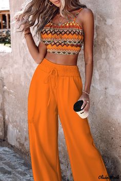 Olivia Mark - Elegant Two-Piece Set with Folded Strap and Sleeveless Design Casual Orange Halter Neck Tank Top, Sleeveless Orange Crop Top For Spring, Casual Orange Tank Top For Vacation, Casual Orange Crop Top For Vacation, Casual Halter Neck Tank Top For Beach Season, Casual Halter Neck Crop Top For Vacation, Casual Orange Tank Top For The Beach, Casual Orange Crop Top For Beach Season, Casual Halter Neck Crop Top For Beach Season