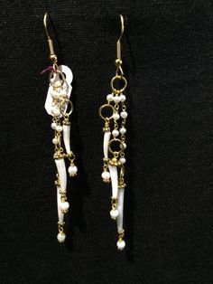 "Pearl Droplet Earrings Artist: Teresa Bradford-Cole Length with gold-filled ear wire: 4\" Pearls, Scaphopoda Shell, with gold-filled spacers and wire. Gorgeous earrings, light to wear, and have so much movement! Yes ~ along with basic simplicity ~ It's all about you You deserve to know about my fabulous Treasure chest HeartbeatHandmade and Big Sur Jade Treasures both (Etsy sites) Tribal Jewelry, Statement Piece Jewelry, Art to Wear Jewelry, Fantastic Fine Leather Beaded Handbags, an array of tr White Wire Wrapped Dangle Hoop Earrings, Gold Dangling Bead Jewelry, Gold Dangling Bead Earrings, Gold Dangle Jewelry With Dangling Beads, Gold Dangle Jewelry With Beads, Gold Beaded Dangle Earrings With French Hook, White Brass Wire Wrapped Earrings, White Brass Drop Earrings, White Brass Dangle Jewelry