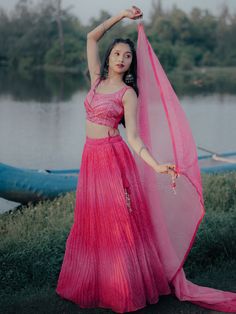 Introducing our stunning pink digital printed organza engagement wear lehenga choli, a must-have for any fashionista looking to make a statement at weddings, receptions, or any casual occasion. This exquisite ensemble features intricate sequins, thread embroidery work, and mirror work, creating a contemporary and elegant look.
The lehenga is crafted from high-quality organza fabric, known for its lightweight and sheer texture, making it perfect for special occasions. The digital print work adds Unstitched Pink Party Wear Choli, Pink Organza Anarkali Set For Diwali, Unstitched Pink Anarkali Set For Party, Pink Dupatta For Summer Wedding, Pink Unstitched Lehenga For Party, Unstitched Pink Lehenga For Party Wear, Summer Wedding Unstitched Lehenga, Summer Organza Lehenga With Dupatta, Pink Saree Sets For Summer