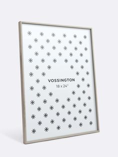 a white and wooden frame with black stars on the bottom that says vosington