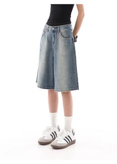 Stay cool and on-trend with our Denim Bermuda Wide-Leg Jean Shorts, a summer wardrobe essential with a retro-chic flair. Crafted for comfort and style, these shorts boast a high-quality denim fabric with a distinctive gradient design and a relaxed fit. Their wide-leg cut provides a breezy, casual look perfect for versatile styling, while the sturdy craftsmanship ensures these shorts are a durable addition to any fashion-forward collection. Whether you're heading to a laid-back brunch or an after Summer Wardrobe Essentials, Gradient Design, Simple Tees, Long Shorts, Retro Chic, Stay Cool, Denim Fabric, Jeans Shorts, Summer Wardrobe