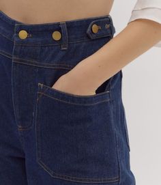 Get ready to strut your stuff in these high-waisted denim pants! Featuring pockets both front and back, an adjustable waist detail, and a button and zipper closure, these pants are perfect for keeping all your essentials close at hand. The belted loops add a touch of style while the non-sheer, medium weight fabric ensures comfort all day long. Don't miss out on adding these versatile pants to your wardrobe! 80%COTTON 20%POLYESTER Denim Blue Utility Flare Jeans With Belt Loops, High Waist Flare Jeans With Button Closure, Denim Blue Utility Bottoms With Belt Loops, Utility Denim Blue Bottoms With Belt Loops, High Waist Utility Cargo Jeans With Button Closure, Everyday Mid-rise Flare Jeans With Belt Loops, Everyday Bottoms With Cropped Legs And Belt Loops, Dark Wash Mid-rise Bottoms With Belt Loops, Mid-rise Dark Wash Bottoms With Belt Loops