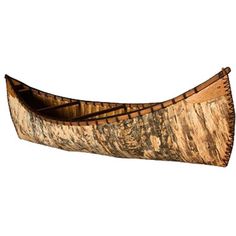 an old canoe made out of wood on a white background