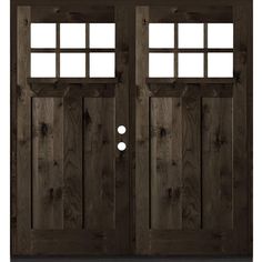 the front door is made from wood and has two sidelights on each side, with glass