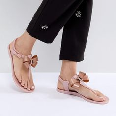 Step Into Holiday Mode With The Camaril Jelly Sandals. A Signature Ted Style, They Come With Looped Bow Detailing That’s Sure To Make Them The Prettiest Pair On The Beach. Never Worn Details: - Ted Baker Footwear Collection - Jelly - Bow Detail - Ted Baker-Branded - Buckle Fastening Care & Fabric: - Fabric Content: Upper: 100% Thermoplastic Polyurethane; Lining: 100% Thermoplastic Polyurethane; Sock: 100% Thermoplastic Polyurethane; Sole: 100% Thermoplastic -Polyurethane Feminine Flat Heel Summer Sandals, Feminine Flat Heel Sandals For Summer, Pink Flat Sandals For Spring, Flat Pink Sandals For Spring, Pink Round Toe Slingback Sandals For Summer, Pink Slingback Sandals With Open Toe For Spring, Pink Ankle Strap Jelly Sandals For Party, Pink Jelly Sandals With Ankle Strap For Party, Feminine Closed Toe Beach Sandals